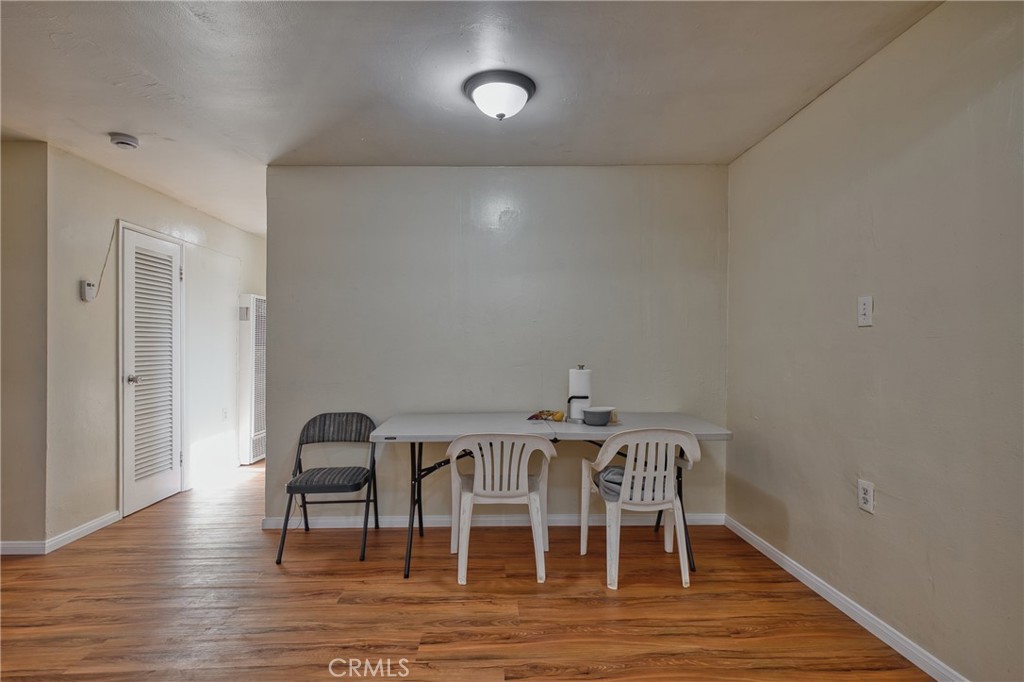 850 West 132nd Street Compton, CA 90222 - Photo 16 of 23 a view of a dining room with furniture and wooden floor