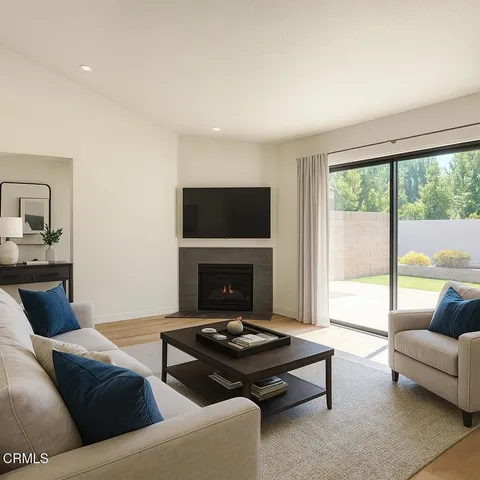 a bedroom with a bed and a table in it