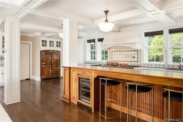 a kitchen with stainless steel appliances a stove and a refrigerator
