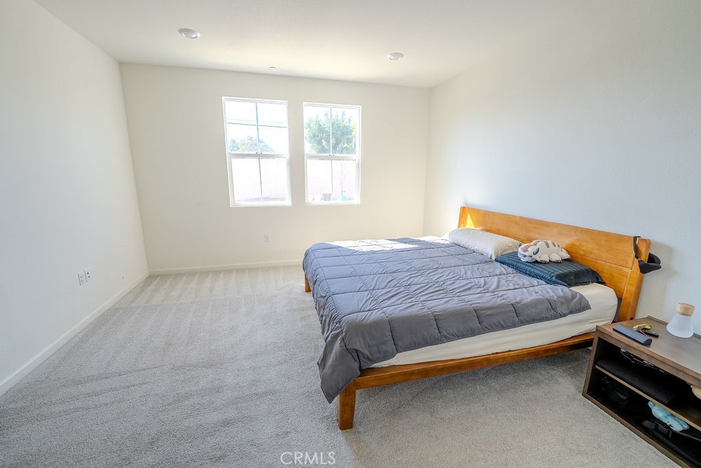 313 Orso Way Oakley, CA 94561 - Photo 11 of 25 a bedroom with a bed and window