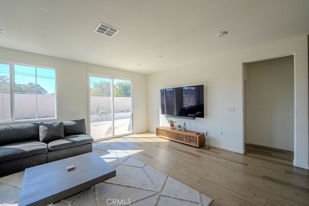 313 Orso Way Oakley, CA 94561 - Photo 2 of 25 a living room with furniture and a flat screen tv
