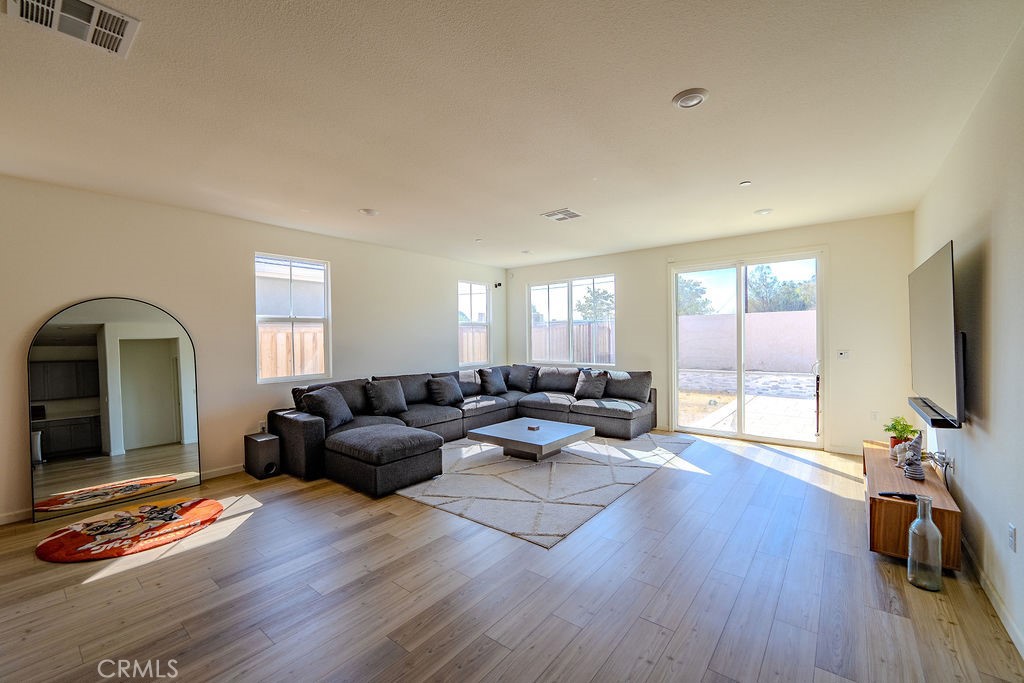 313 Orso Way Oakley, CA 94561 - Photo 3 of 25 a living room with furniture and a flat screen tv