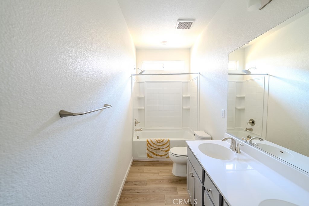 313 Orso Way Oakley, CA 94561 - Photo 7 of 25 a bathroom with a sink a toilet and shower