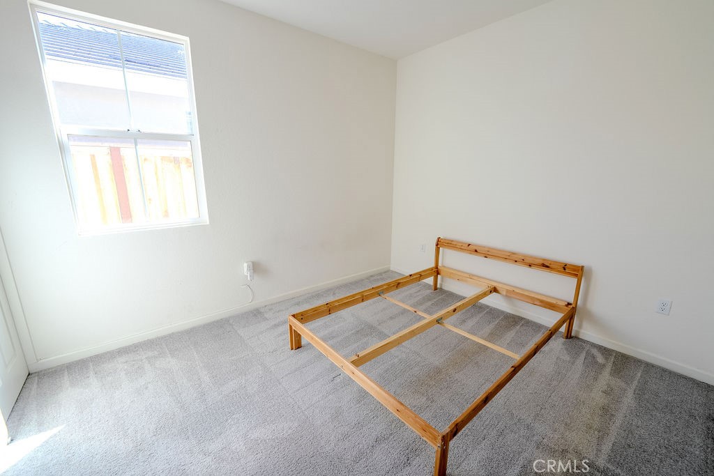 313 Orso Way Oakley, CA 94561 - Photo 8 of 25 an empty room with windows
