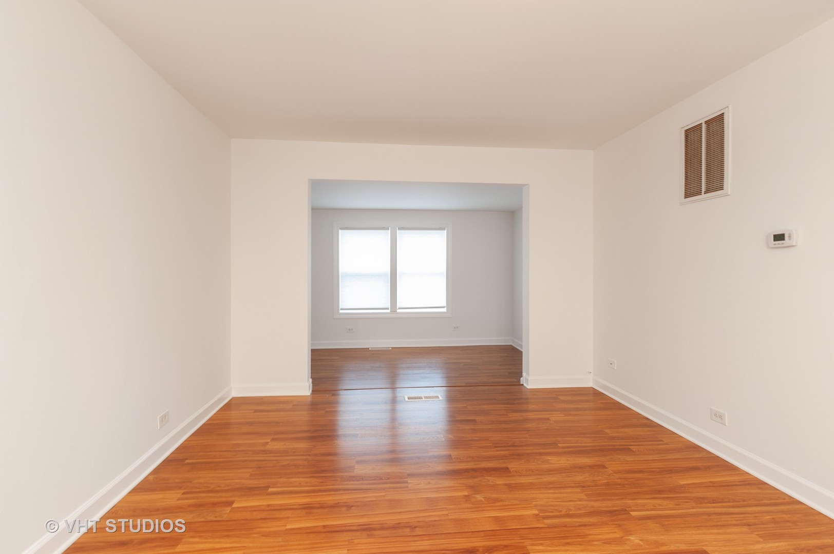 34587 North Wilson Road Ingleside, IL 60041 - Photo 2 of 10 a view of empty room with wooden floor and fan
