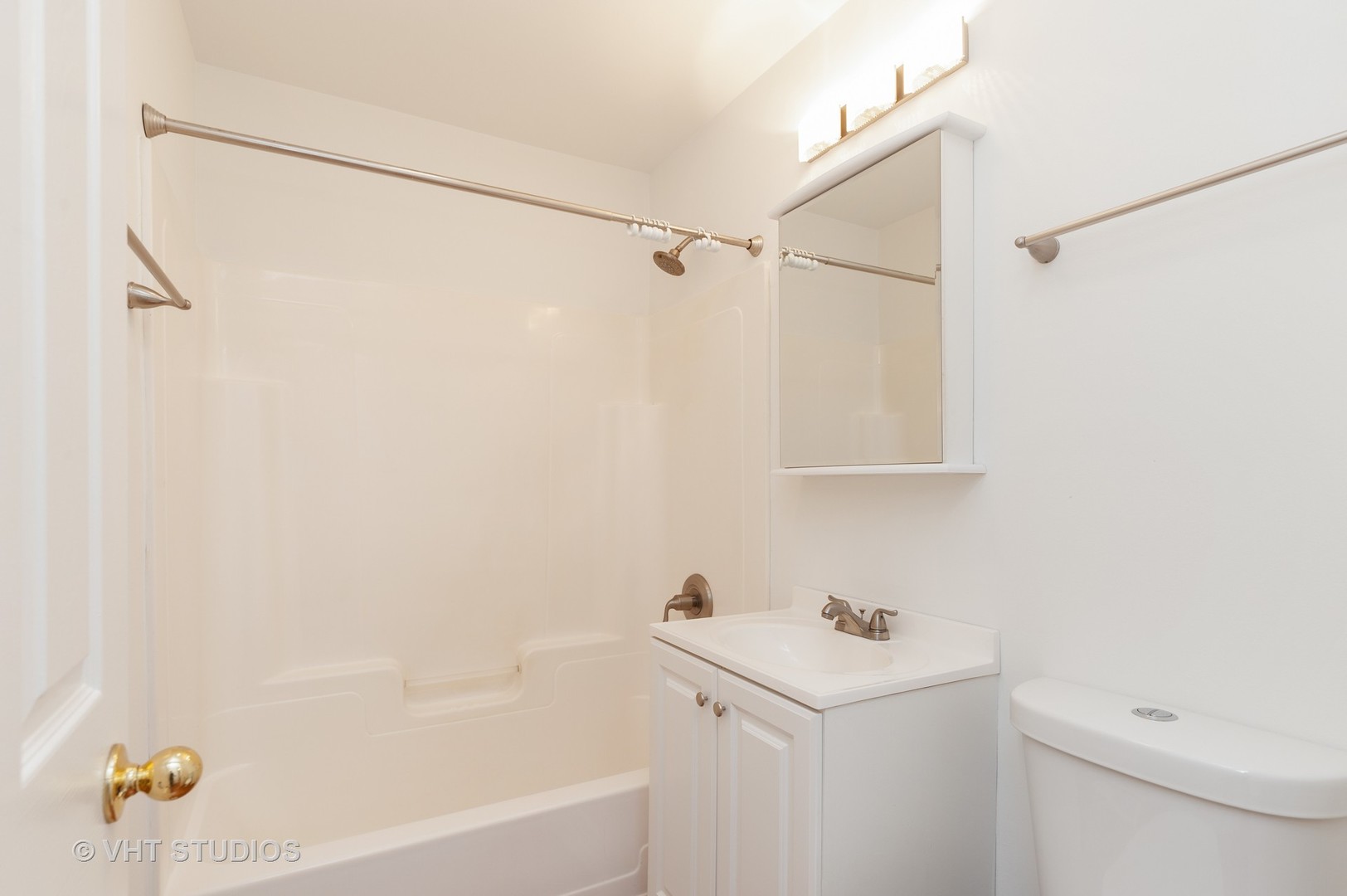 34587 North Wilson Road Ingleside, IL 60041 - Photo 7 of 10 a bathroom with a sink a vanity and a shower