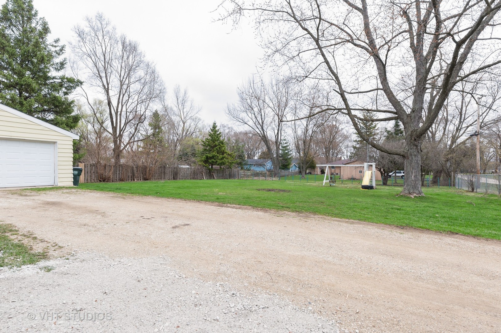 34587 North Wilson Road Ingleside, IL 60041 - Photo 10 of 10 a view of a house with a big yard and large trees