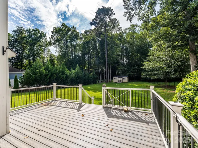 a view of swimming pool with a patio