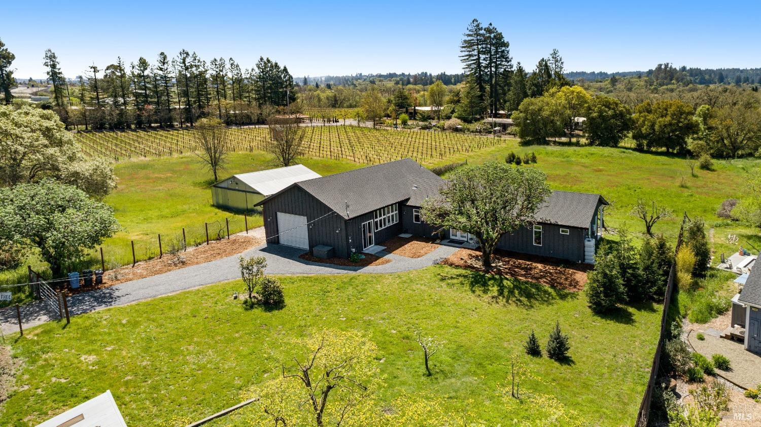 a view of a lake with a house in the background