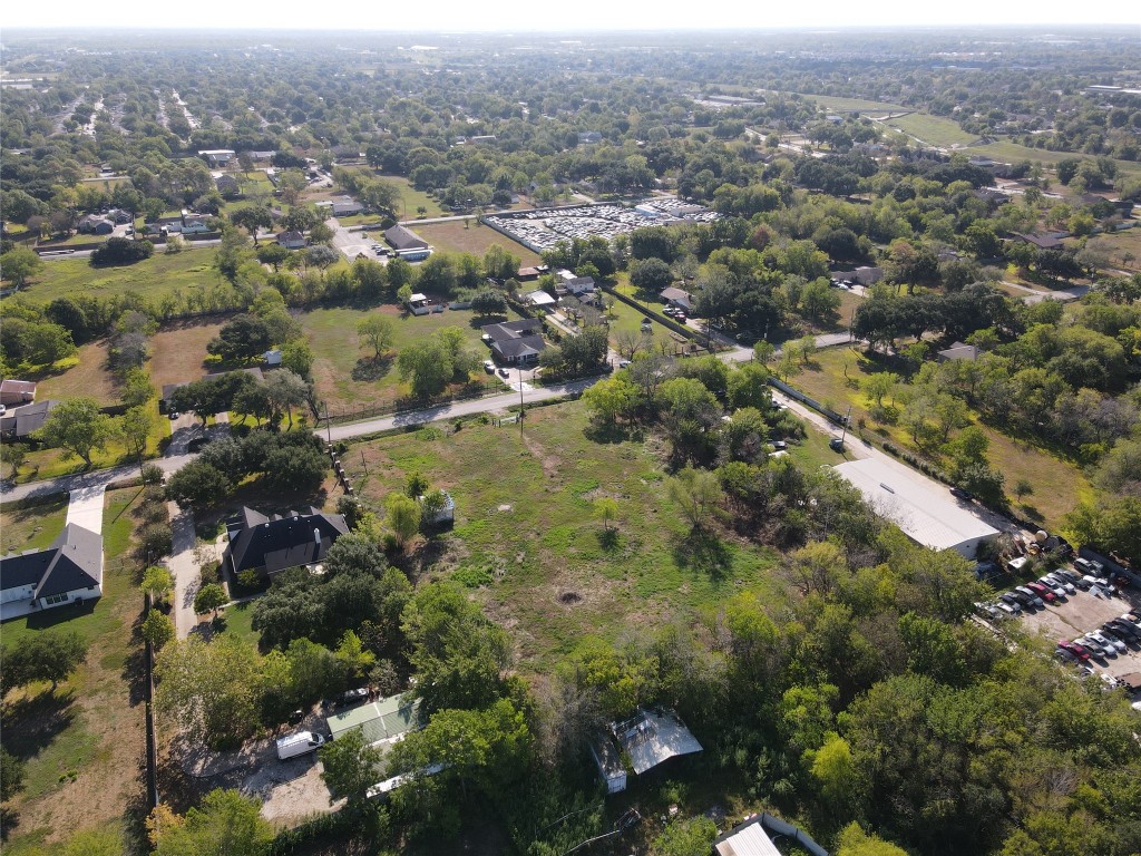 13932 Wrigley Street Houston, TX 77045 - Photo 6 of 8 an aerial view of house with yard and mountain view in back