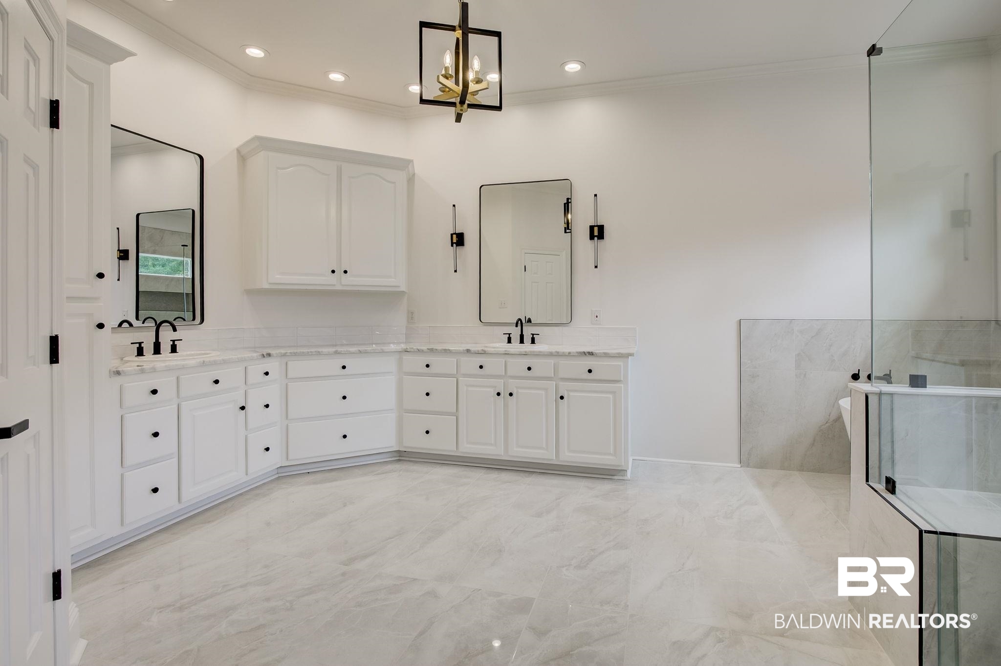 105 High Pines Ridge Fairhope, AL 36532 - Photo 50 of 97 Bathroom with crown molding, double vanity, a chandelier, marble look tiles, and a walk in shower