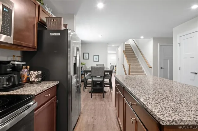 a kitchen with granite countertop lots of counter top space
