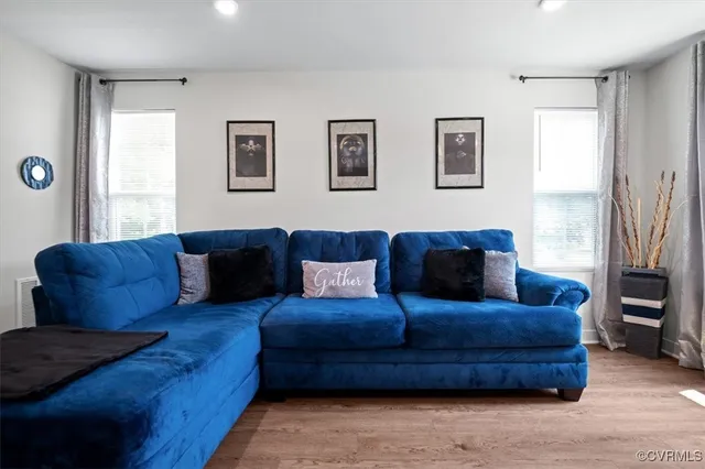 a living room with furniture and a couch