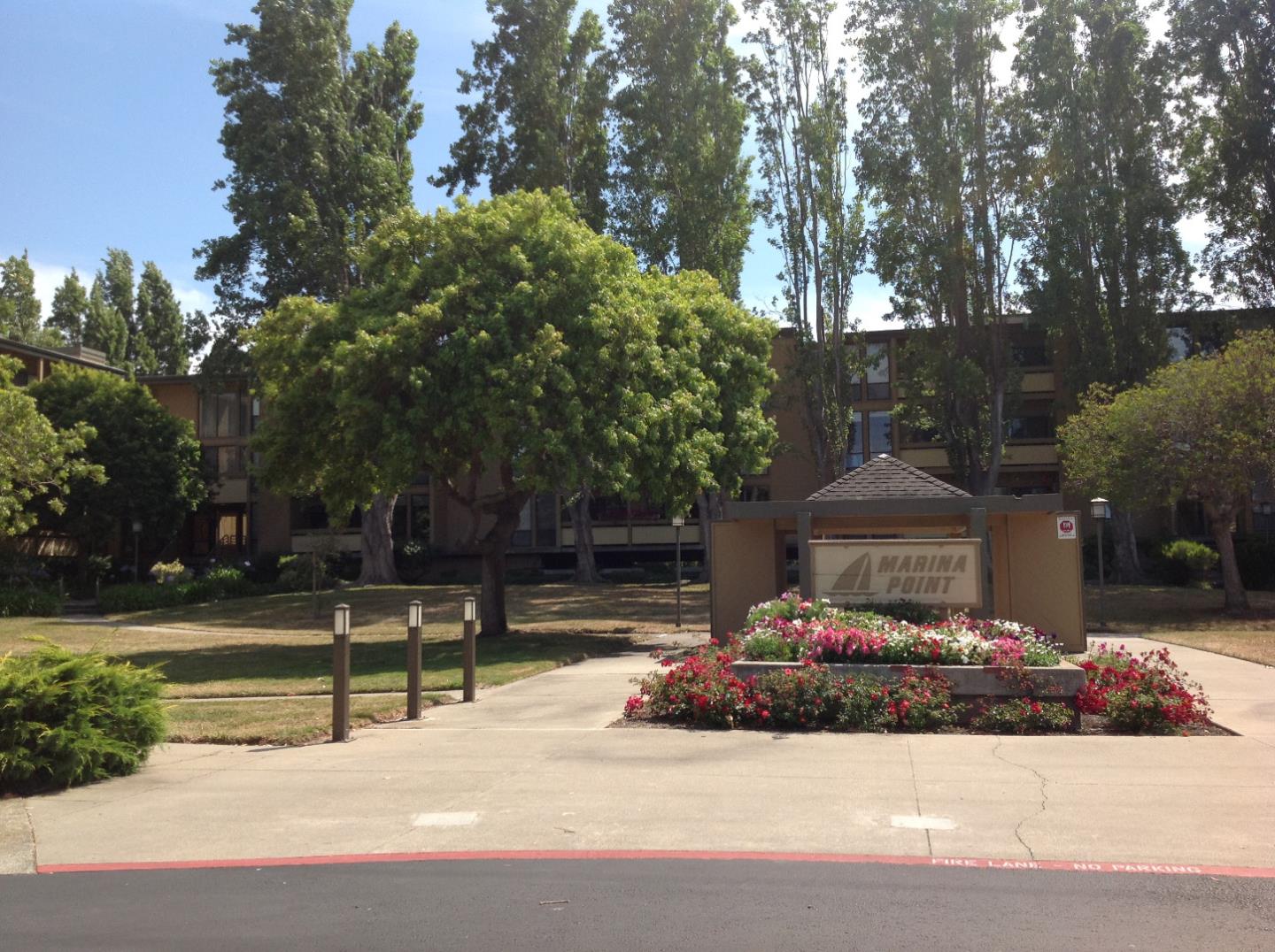 a park view with sitting space and trees