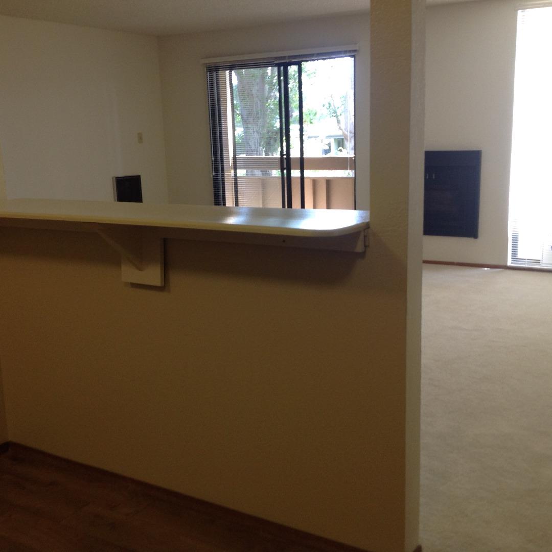 1171 Compass Lane, Unit 202 Foster City, CA 94404 - Photo 6 of 8 a view of an empty room with a window