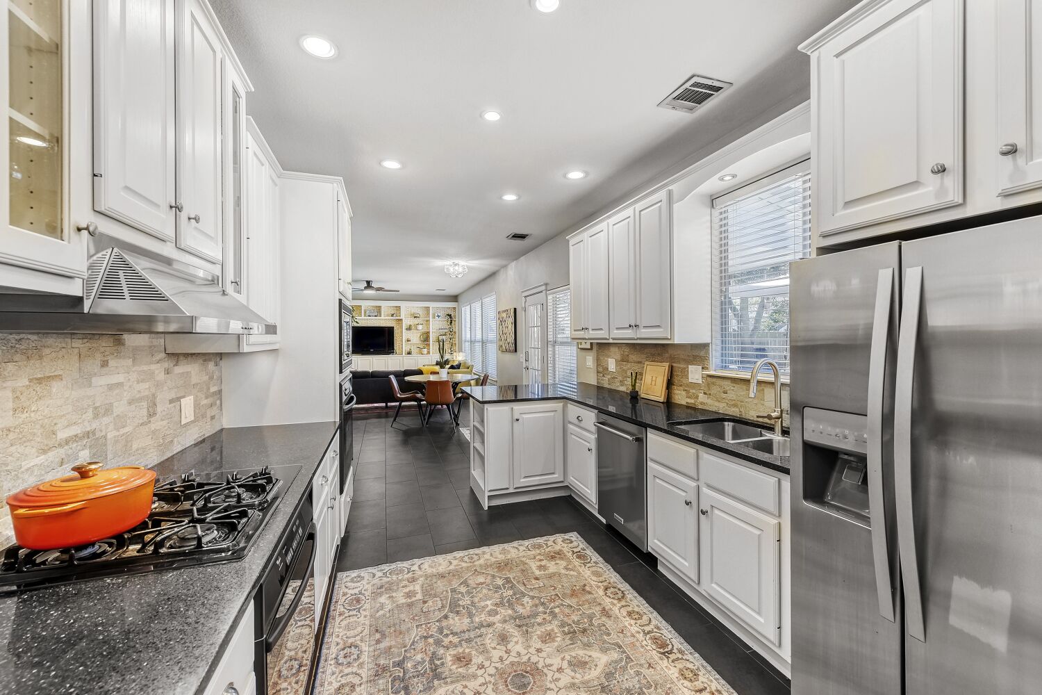 9504 Prescott Drive Austin, TX 78749 - Photo 8 of 33 Well-lit kitchen with lots of counter space and cabinets.