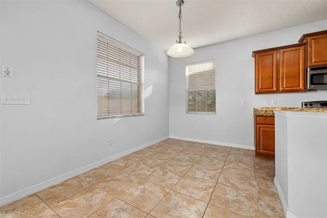 a room with furniture and gym equipment