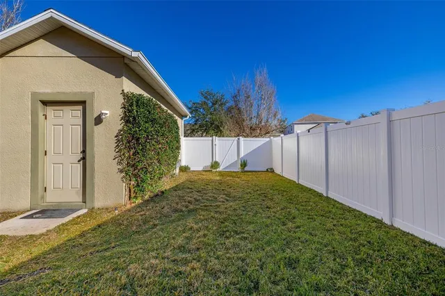 an aerial view of residential houses with swimming pool
