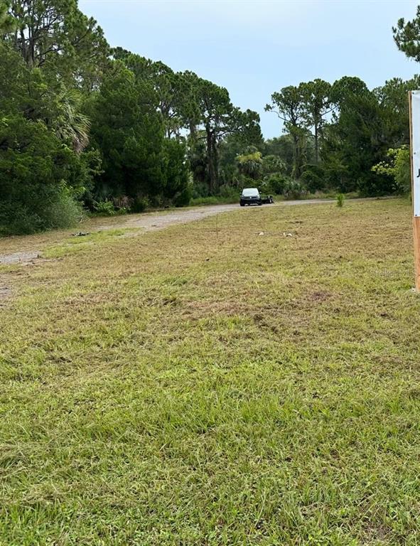 3493 South Ridgewood Avenue Edgewater, FL 32141 - Photo 4 of 4 a view of a field with an outdoor space