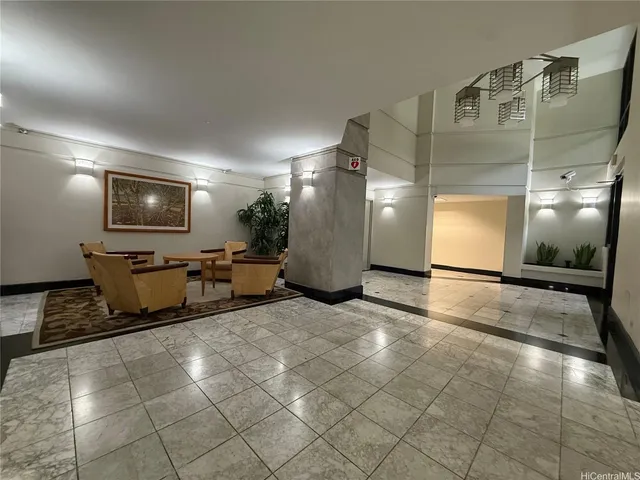 a view of empty room with windows