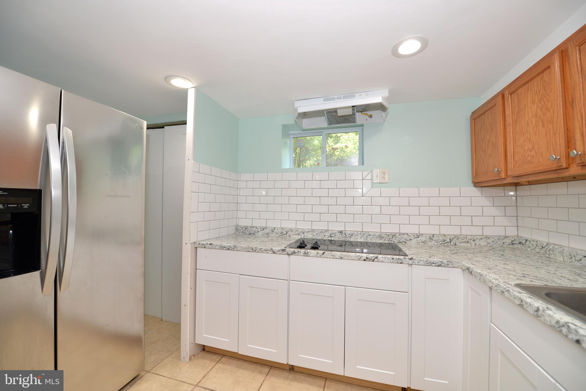 10807 Old Fort Road Fort Washington, MD 20744 - Photo 13 of 25 Full kitchenette in basement