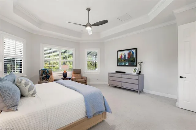 a bedroom with bed and window