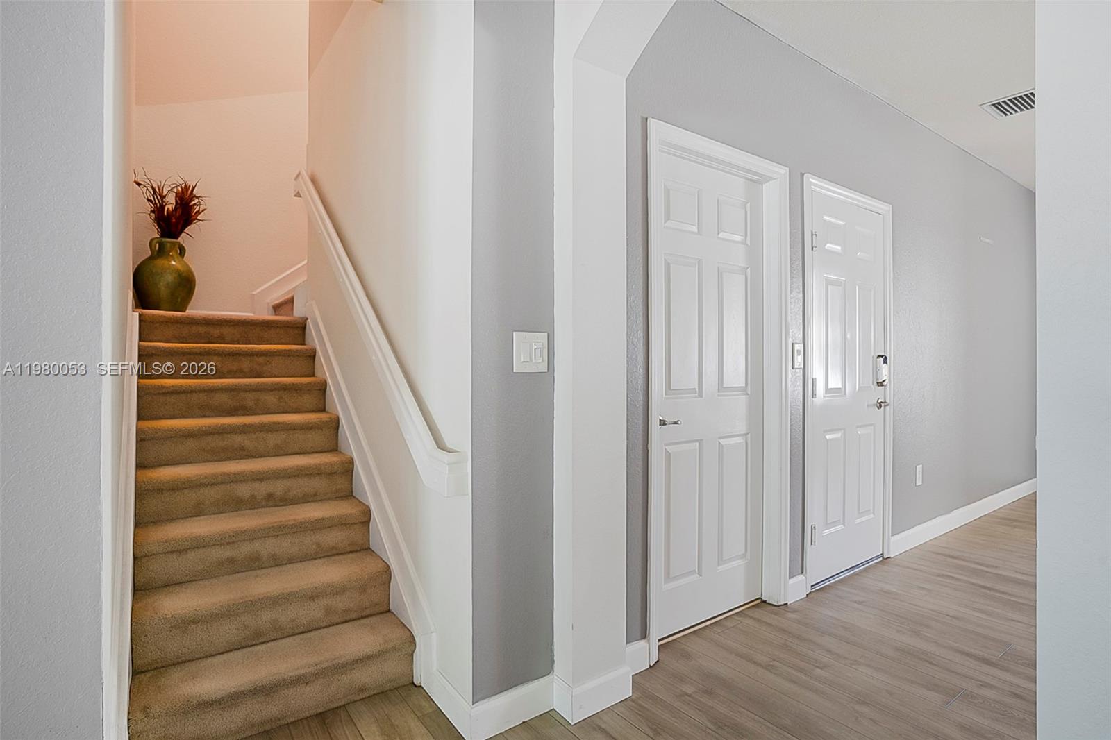 11271 Southwest 234 Terrace Homestead, FL 33032 - Photo 17 of 44 a view of entryway and gallery with wooden floor