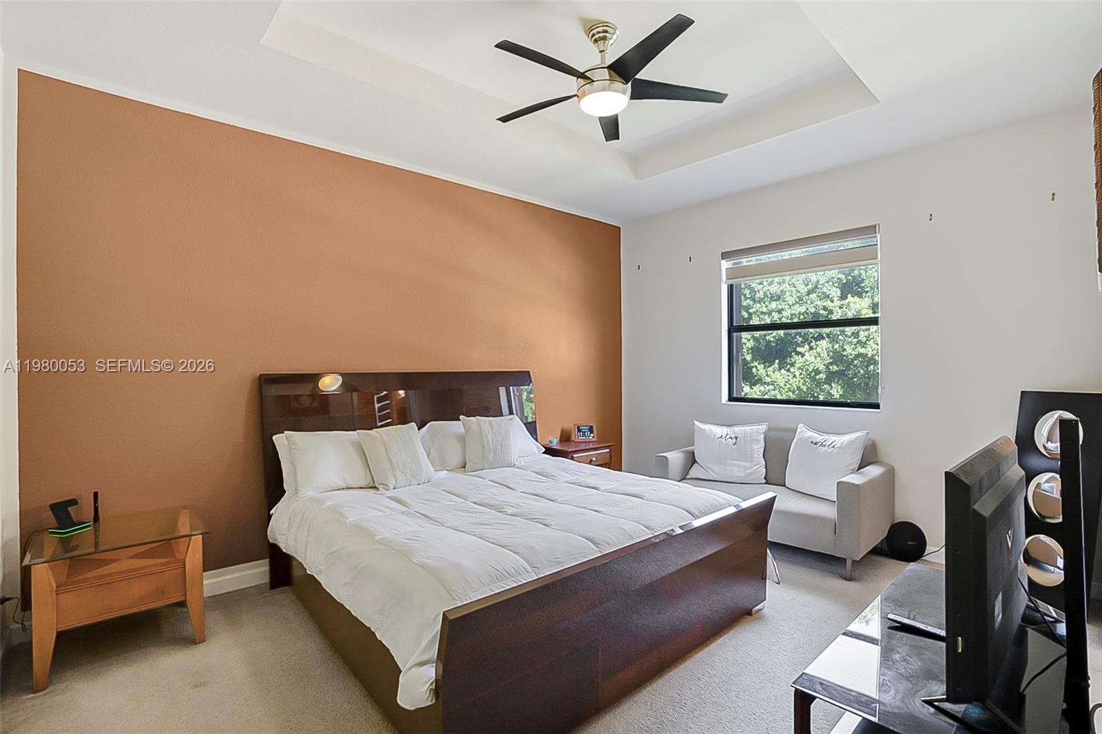 11271 Southwest 234 Terrace Homestead, FL 33032 - Photo 19 of 44 a bedroom with a bed and window