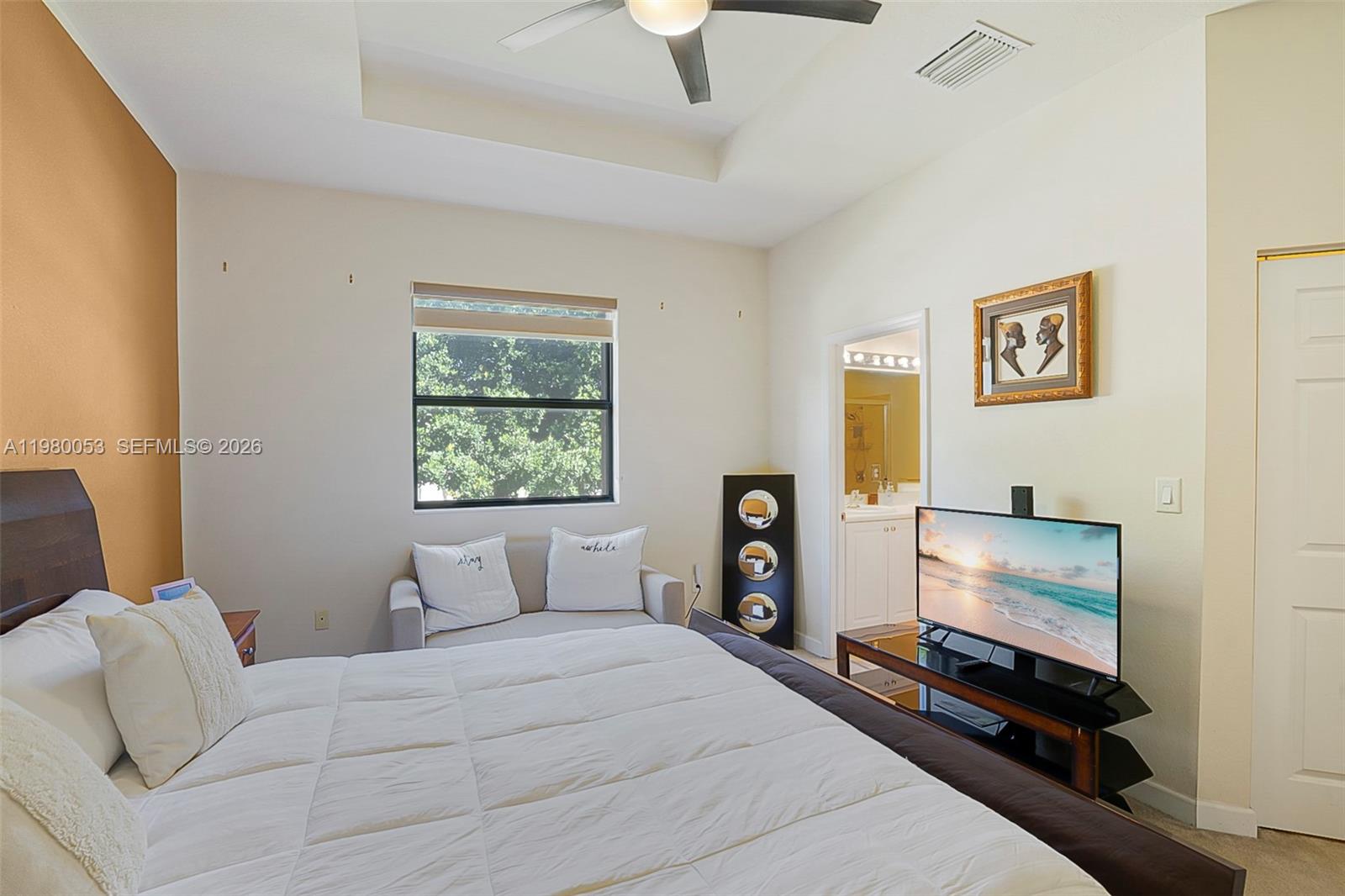 11271 Southwest 234 Terrace Homestead, FL 33032 - Photo 20 of 44 a bedroom with a bed and window