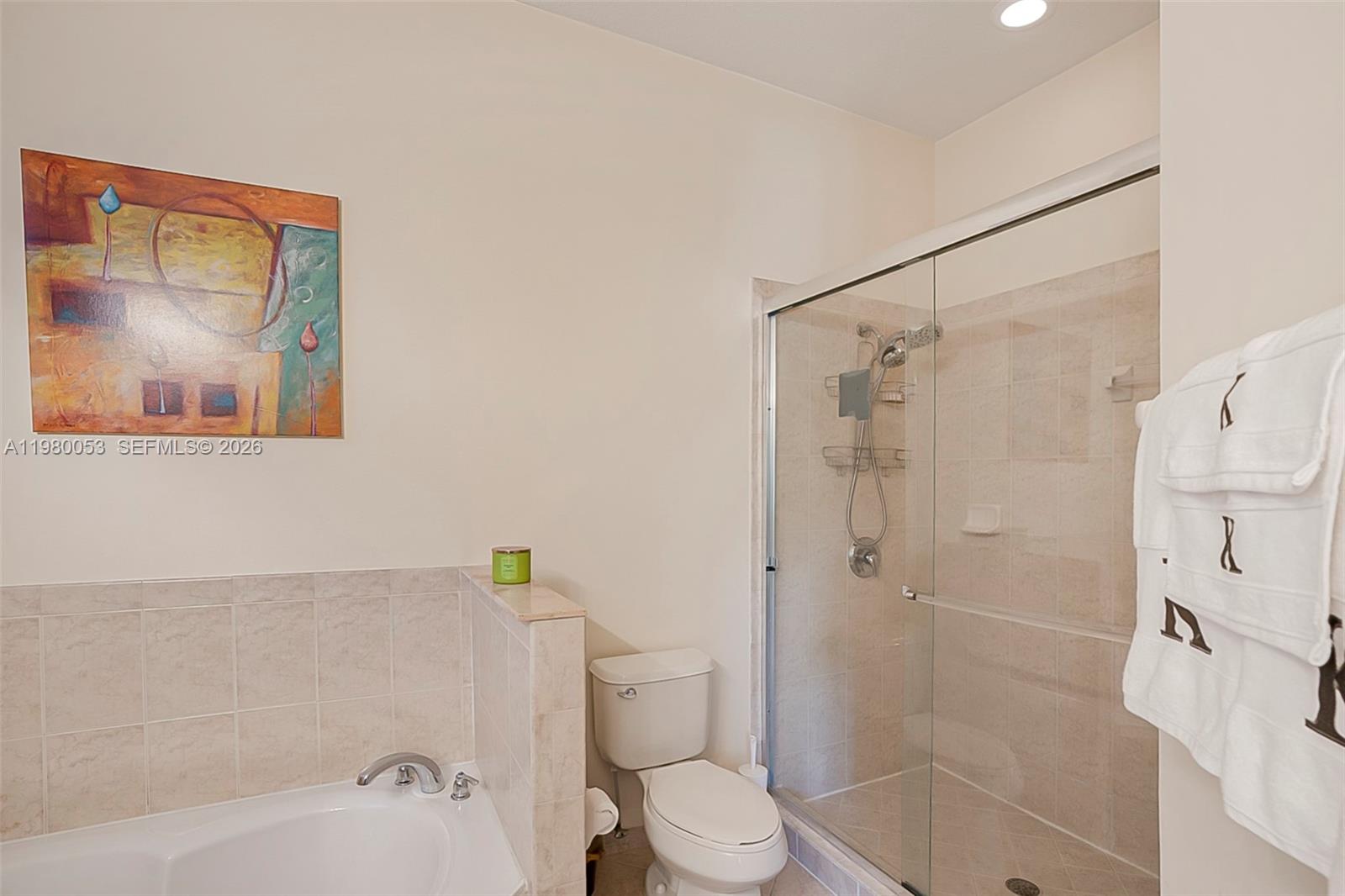 11271 Southwest 234 Terrace Homestead, FL 33032 - Photo 22 of 44 a bathroom with a shower and a toilet