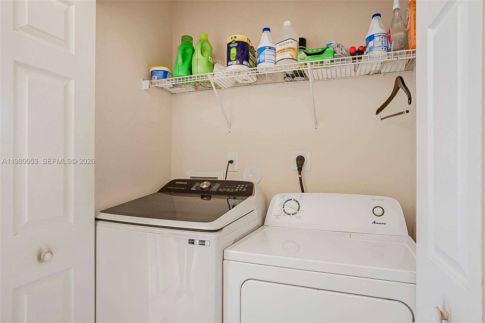 11271 Southwest 234 Terrace Homestead, FL 33032 - Photo 28 of 44 a utility room with dryer and washer
