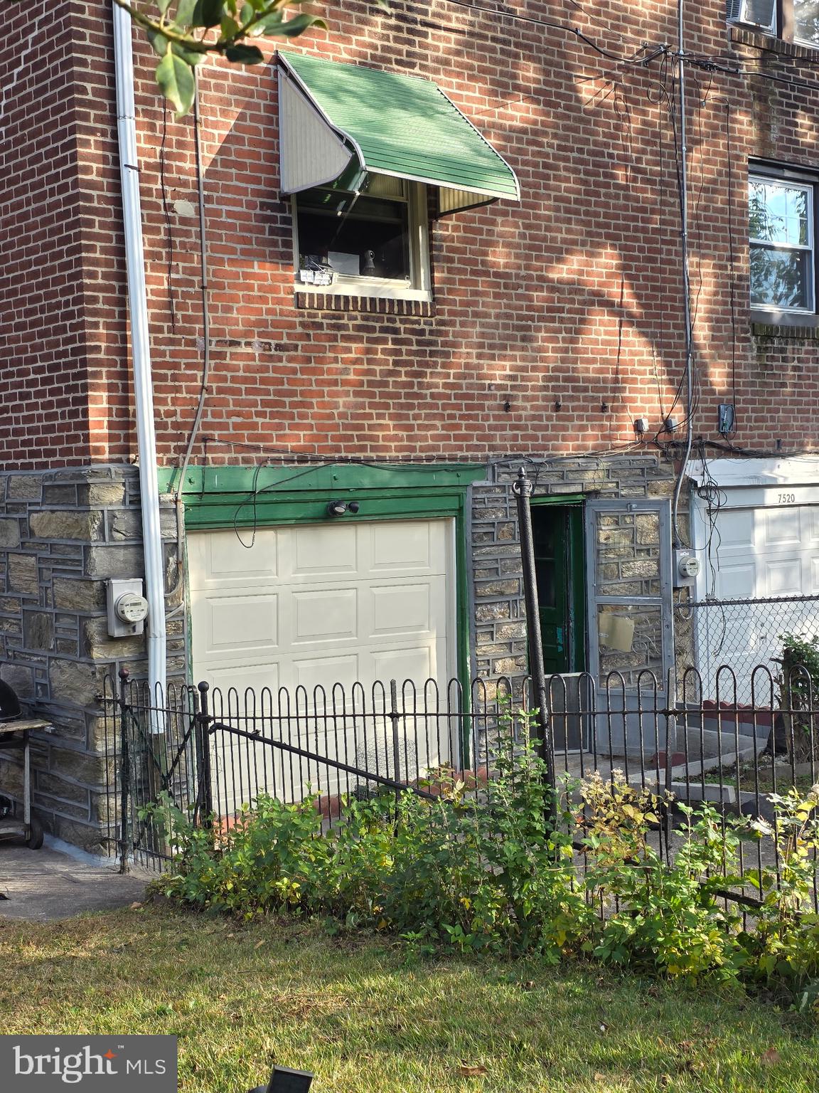 7522 North 21st Street Philadelphia, PA 19138 - Photo 21 of 26 a front view of a house with a garden