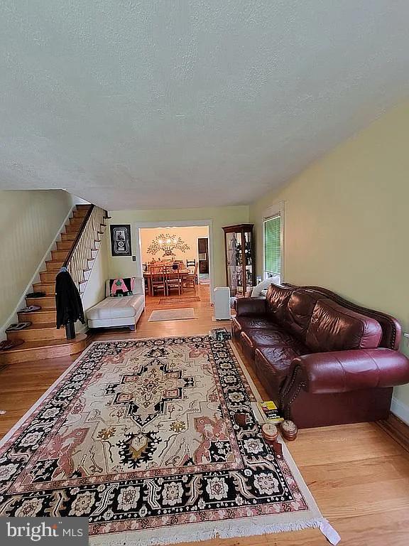 7522 North 21st Street Philadelphia, PA 19138 - Photo 4 of 26 a living room with a couch and a dresser