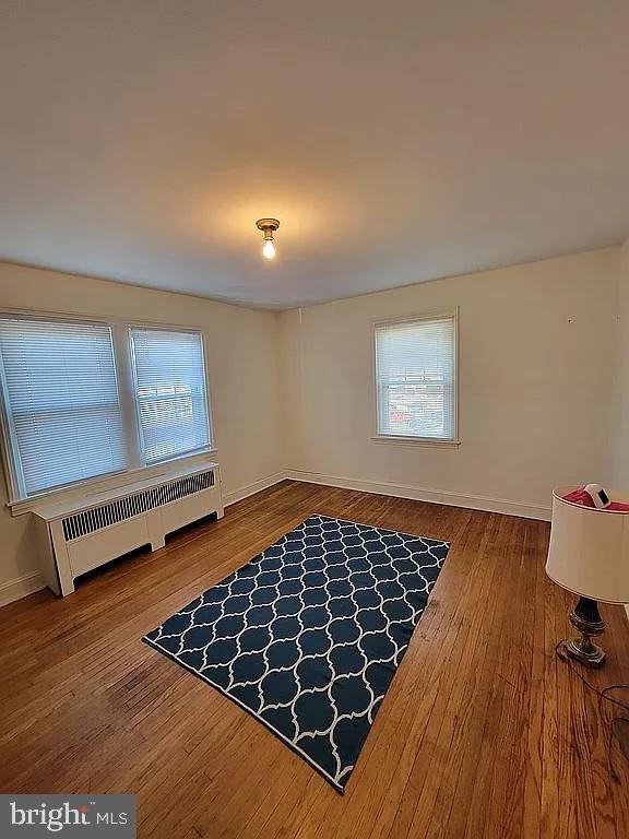 7522 North 21st Street Philadelphia, PA 19138 - Photo 9 of 26 a view of a room with wooden floor and window