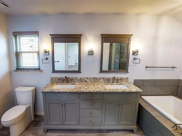 a bathroom with a sink and a toilet