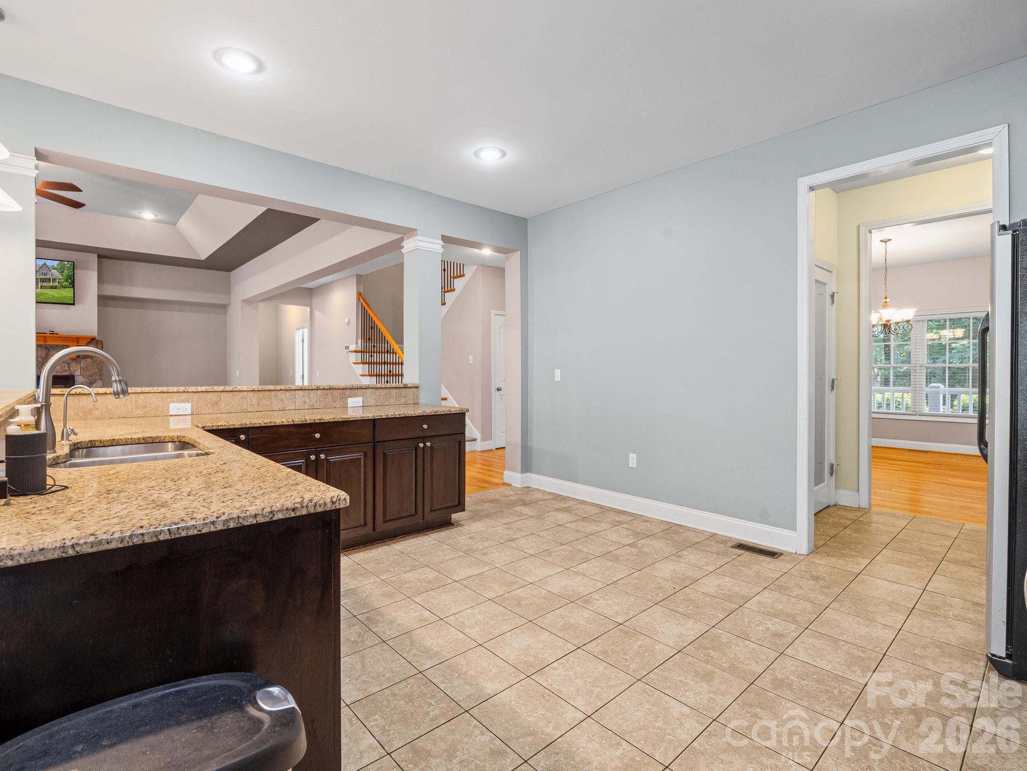 217 Blossom Hill Road Lincolnton, NC 28092 - Photo 19 of 44 a kitchen with a sink a counter top space and cabinets