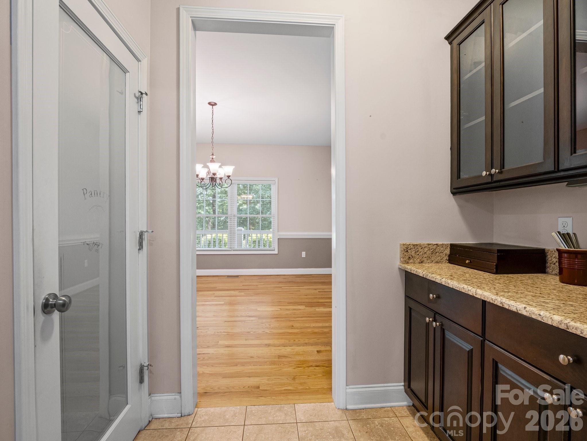 217 Blossom Hill Road Lincolnton, NC 28092 - Photo 22 of 44 a bathroom with a granite countertop sink and a mirror