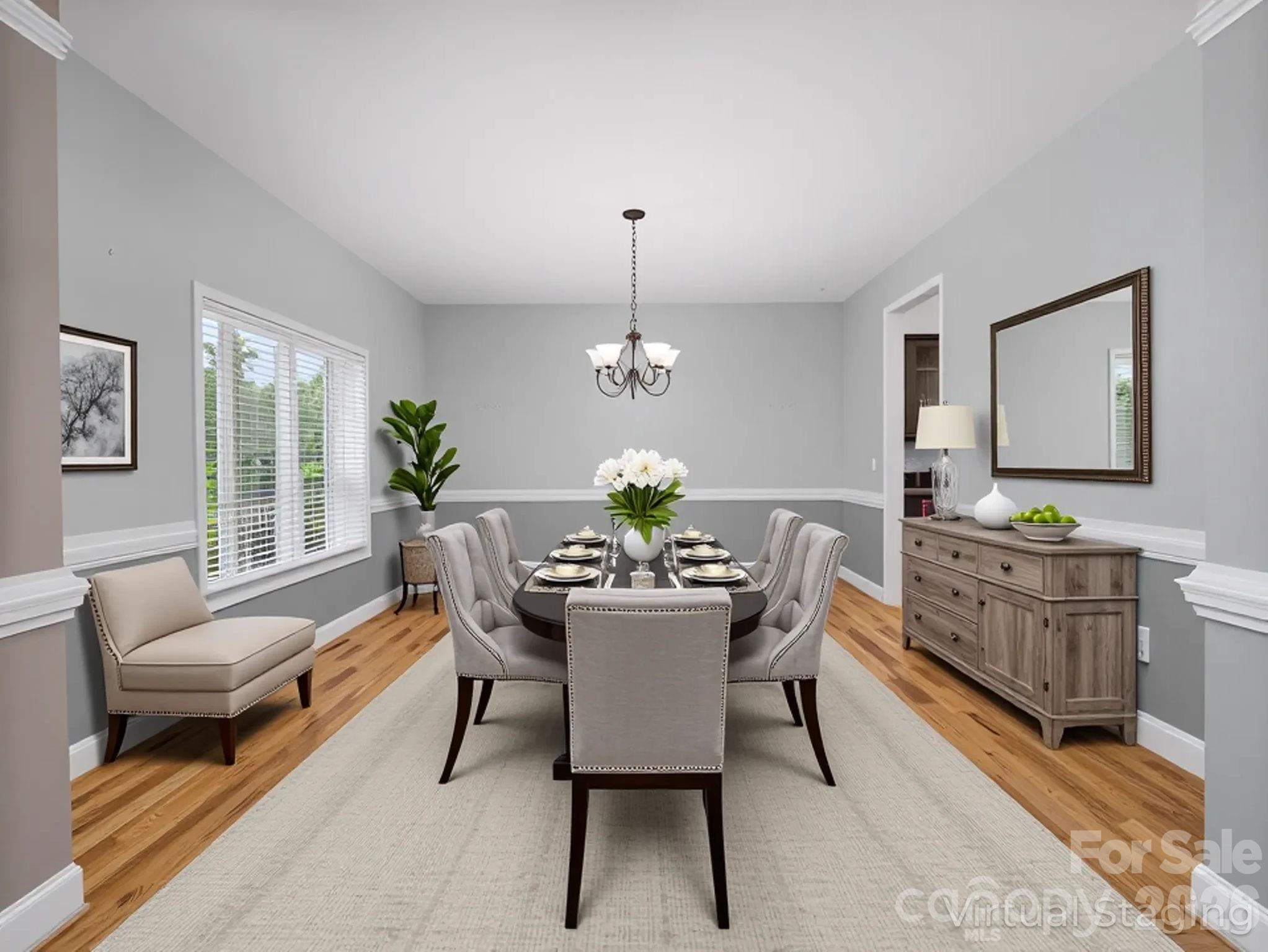 217 Blossom Hill Road Lincolnton, NC 28092 - Photo 23 of 44 a dining room with furniture a livingroom and chandelier