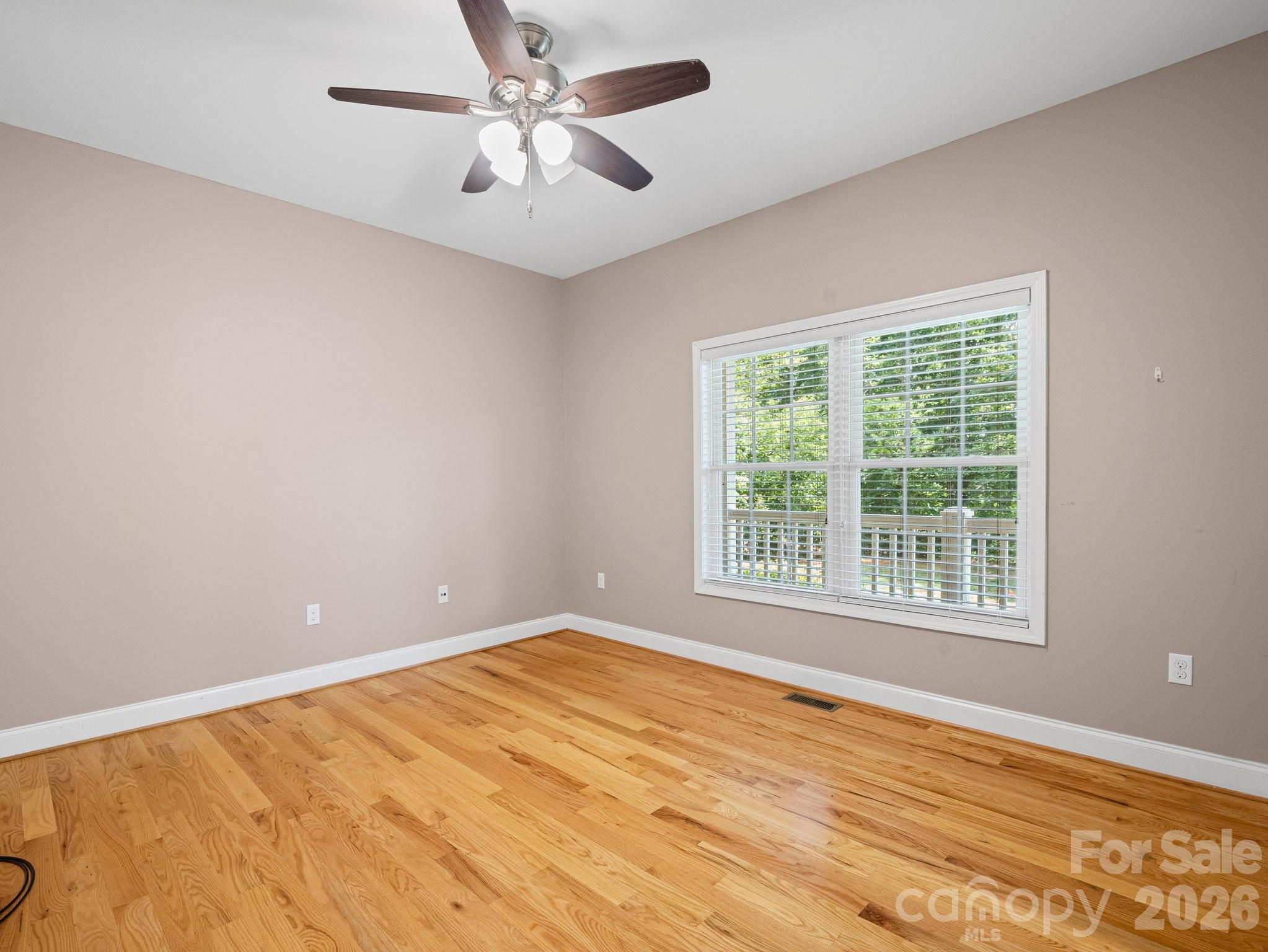 217 Blossom Hill Road Lincolnton, NC 28092 - Photo 26 of 44 a view of an empty room with a window