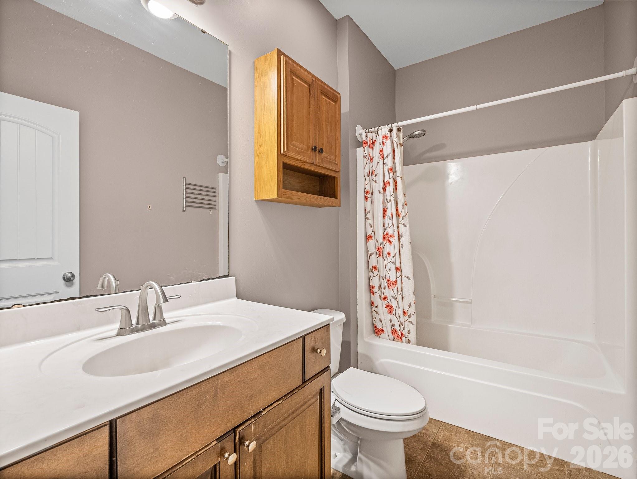 217 Blossom Hill Road Lincolnton, NC 28092 - Photo 38 of 44 a bathroom with a sink toilet and shower