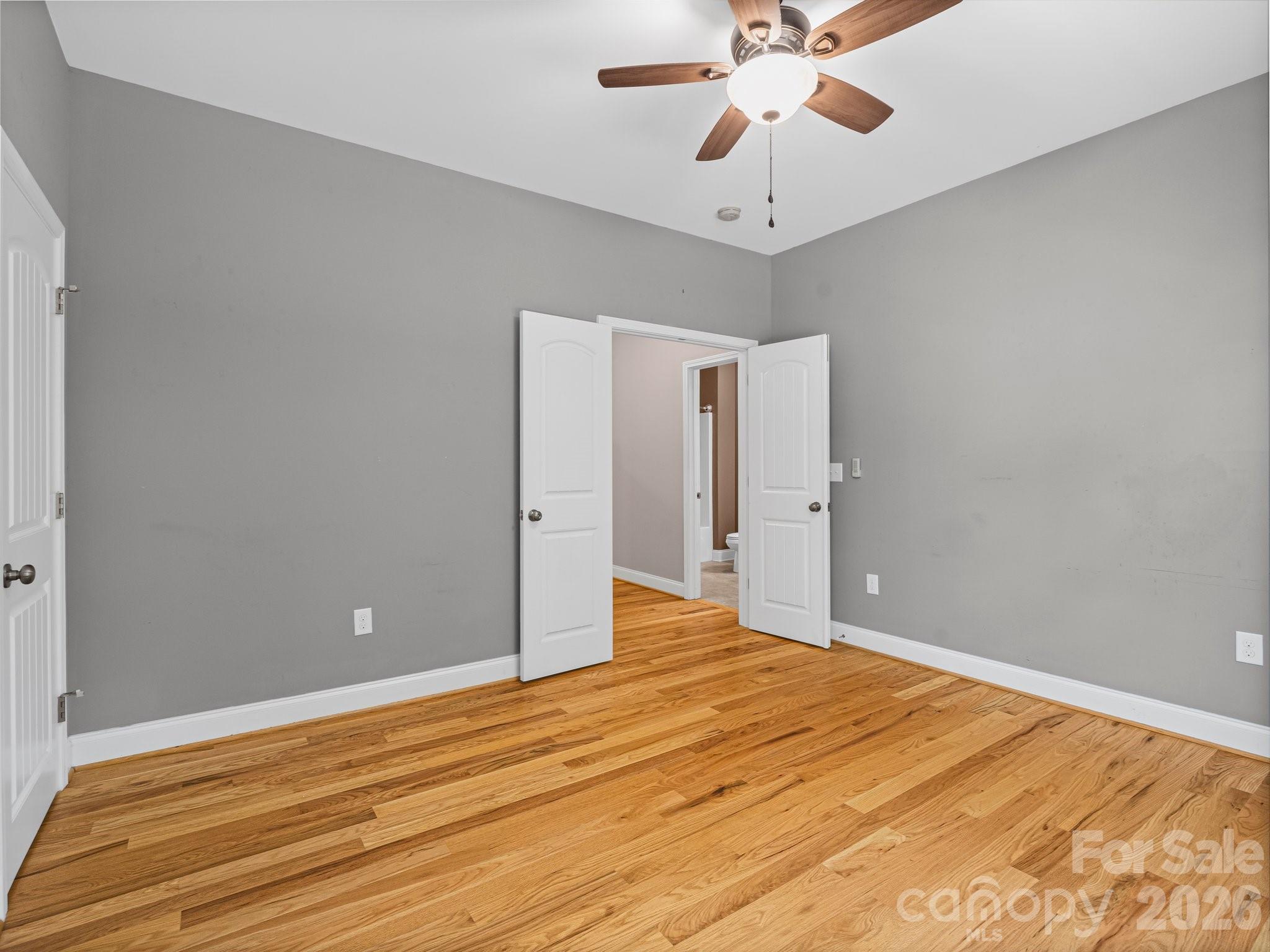 217 Blossom Hill Road Lincolnton, NC 28092 - Photo 42 of 44 a view of empty room with wooden floor