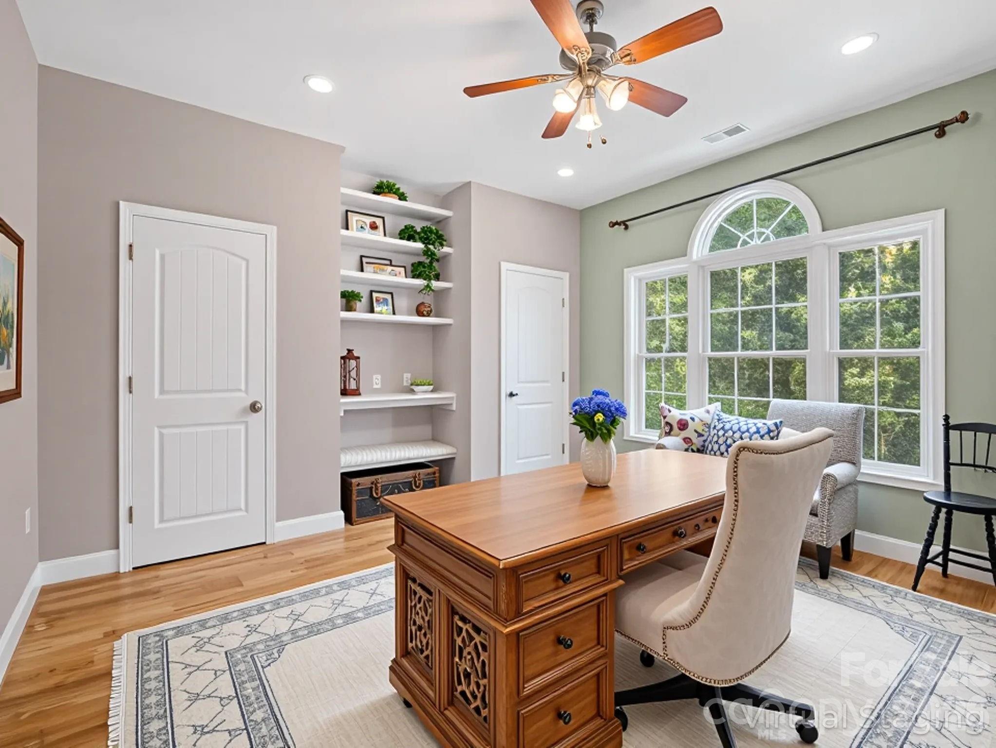 217 Blossom Hill Road Lincolnton, NC 28092 - Photo 44 of 44 a living room with furniture a table and a large window