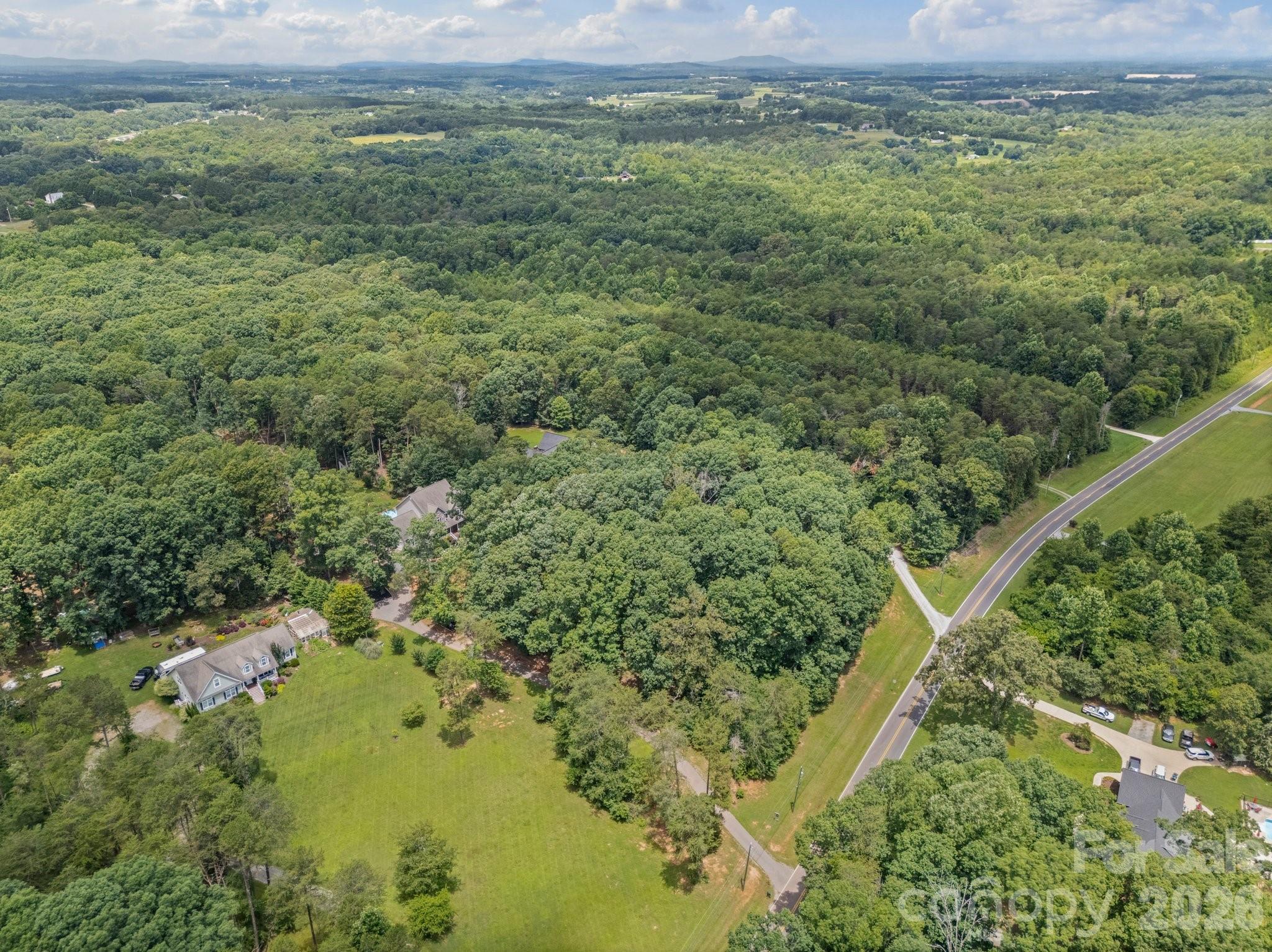 217 Blossom Hill Road Lincolnton, NC 28092 - Photo 5 of 44 a view of a field with an ocean view