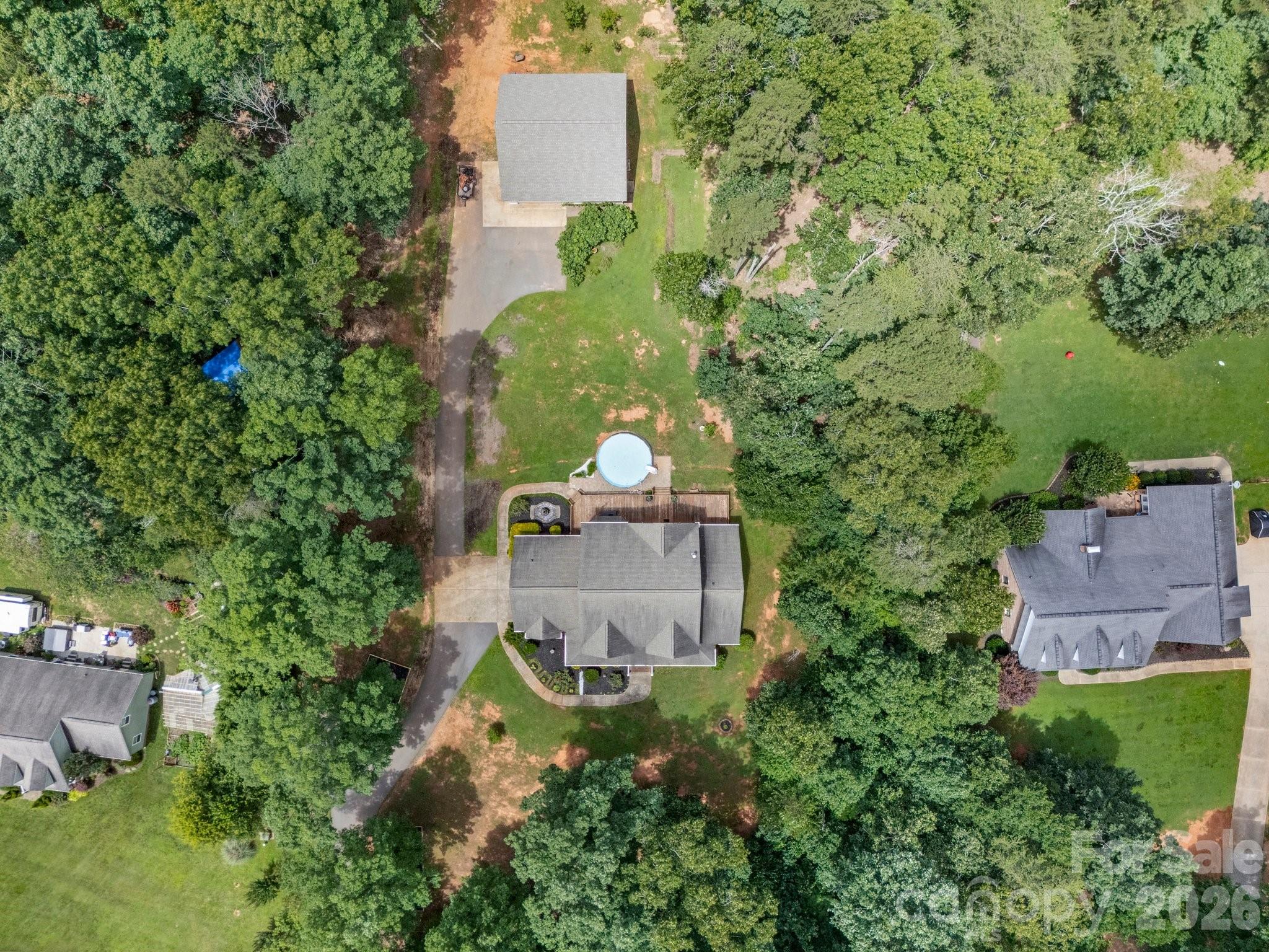 217 Blossom Hill Road Lincolnton, NC 28092 - Photo 7 of 44 an aerial view of a house with a yard and garden