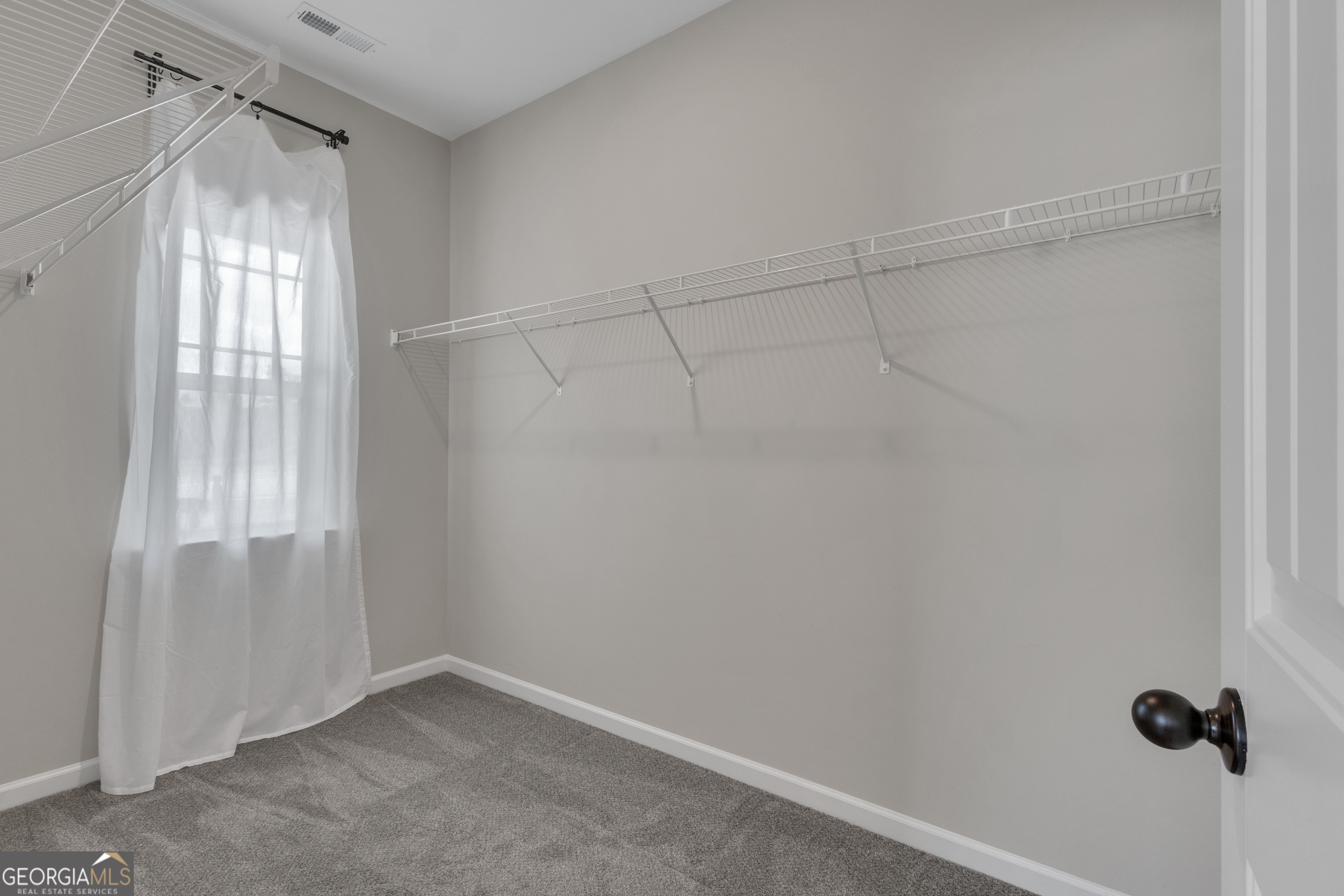 50 Cushing Street Senoia, GA 30276 - Photo 26 of 72 a view of an empty room with a window