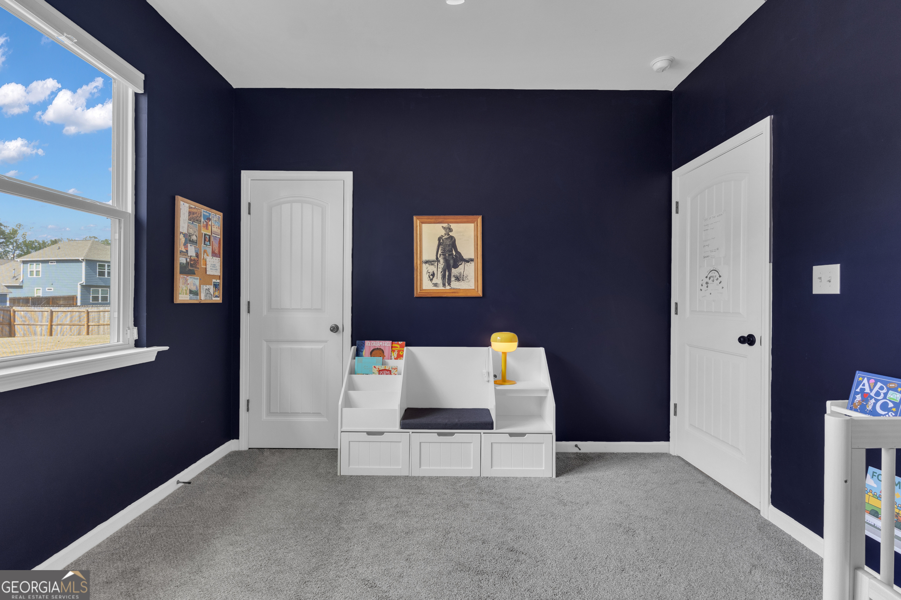 50 Cushing Street Senoia, GA 30276 - Photo 34 of 72 a room with furniture and window