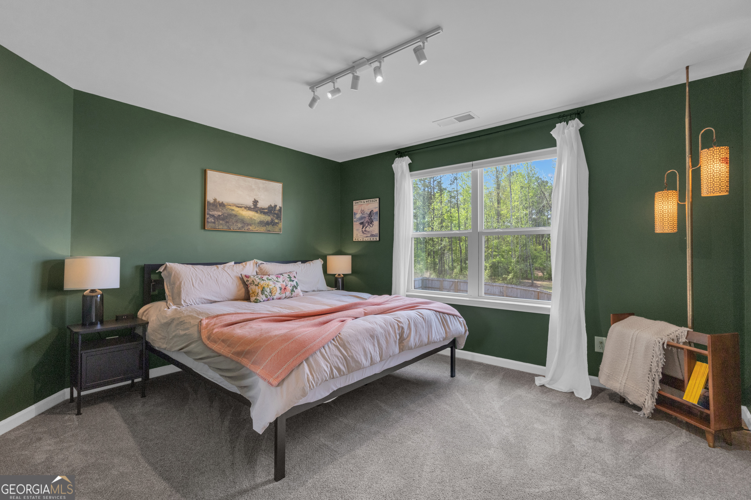50 Cushing Street Senoia, GA 30276 - Photo 42 of 72 a bedroom with a bed chair and window