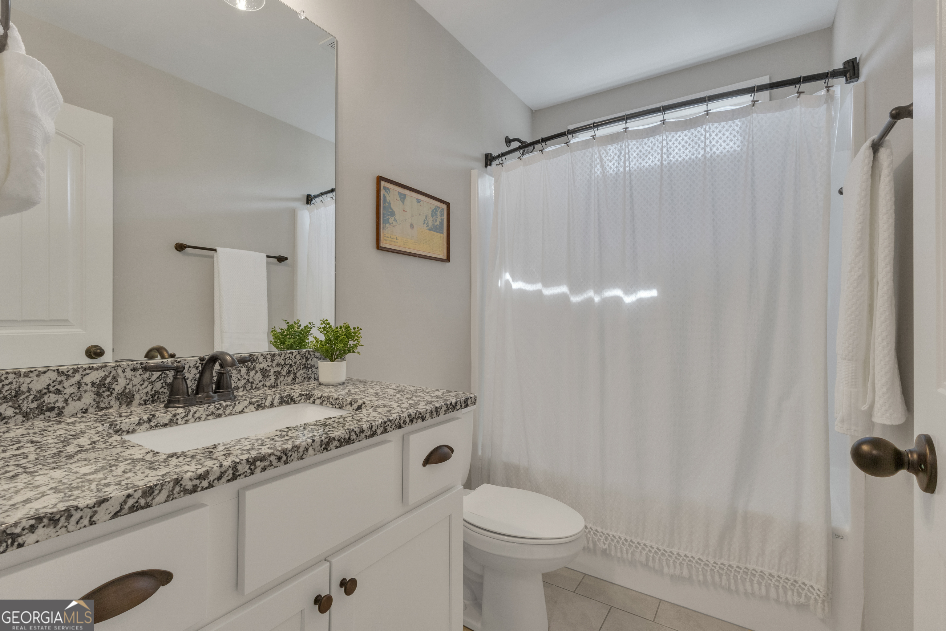 50 Cushing Street Senoia, GA 30276 - Photo 45 of 72 a bathroom with a granite countertop sink toilet and shower