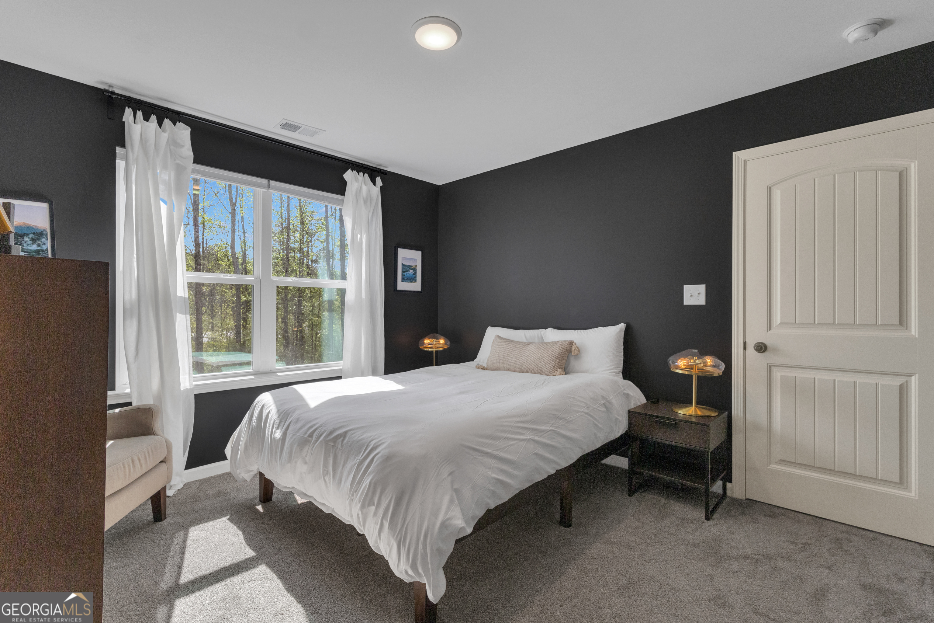 50 Cushing Street Senoia, GA 30276 - Photo 47 of 72 a bedroom with a bed and a window