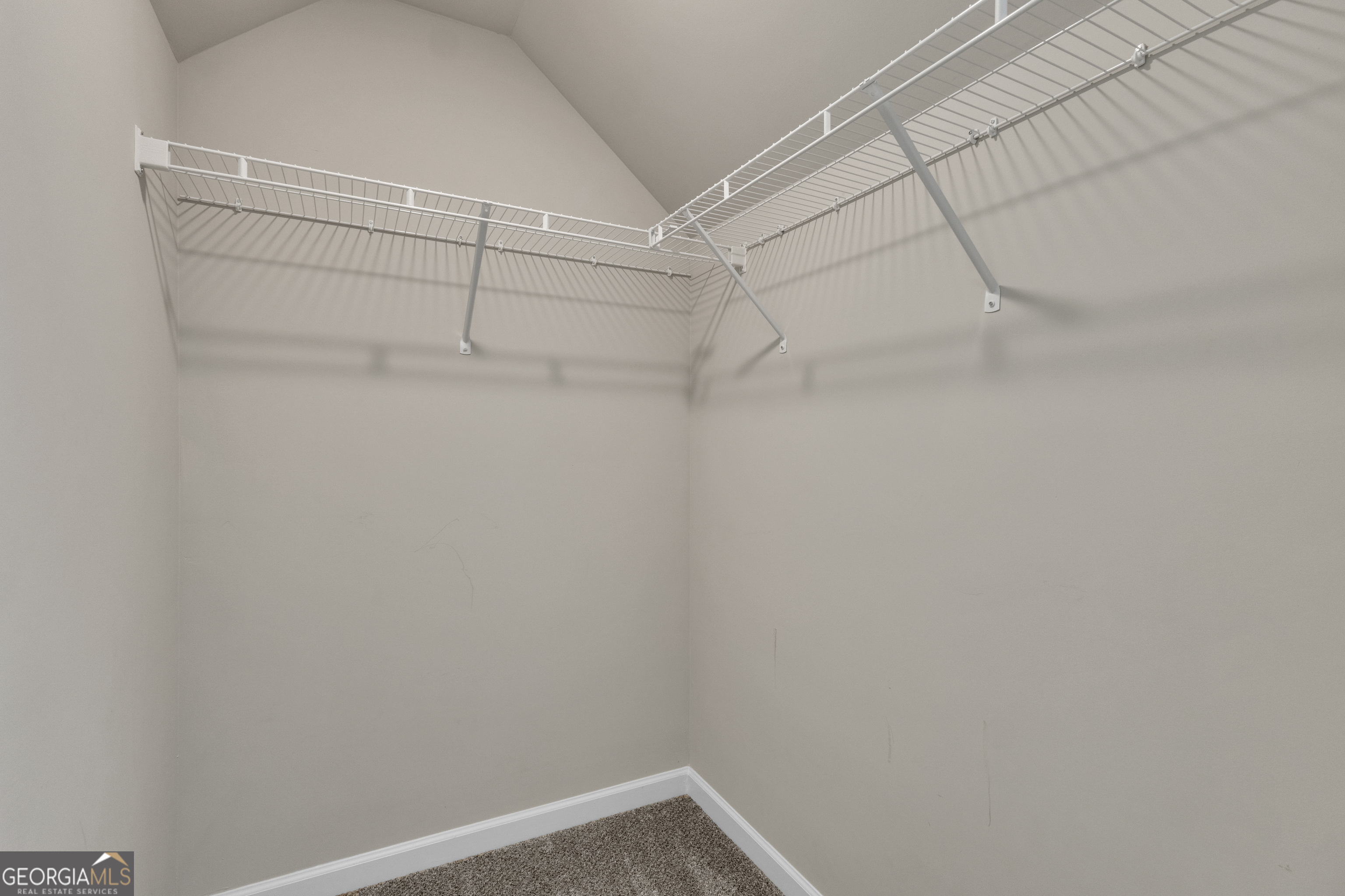 50 Cushing Street Senoia, GA 30276 - Photo 49 of 72 a view of a room with racks on the wall